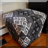 F05. Ottoman with geometric upholstery 